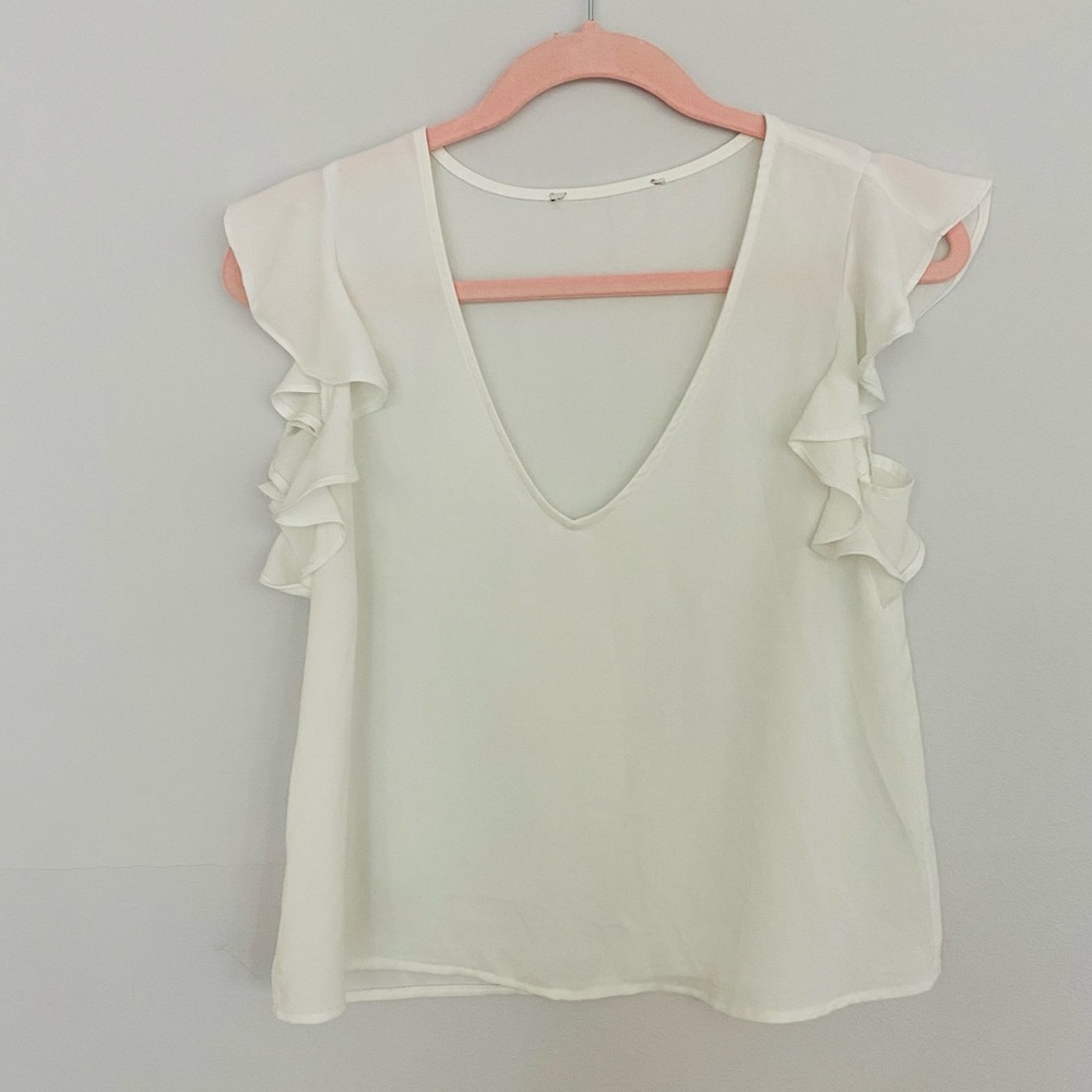 White crop top blouse with ruffle sleeves